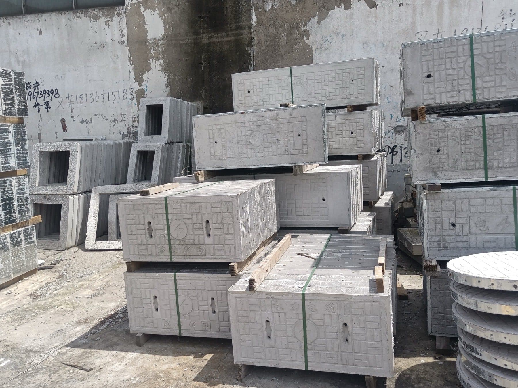 Precast utility boxes, covers and rings in a storage yard