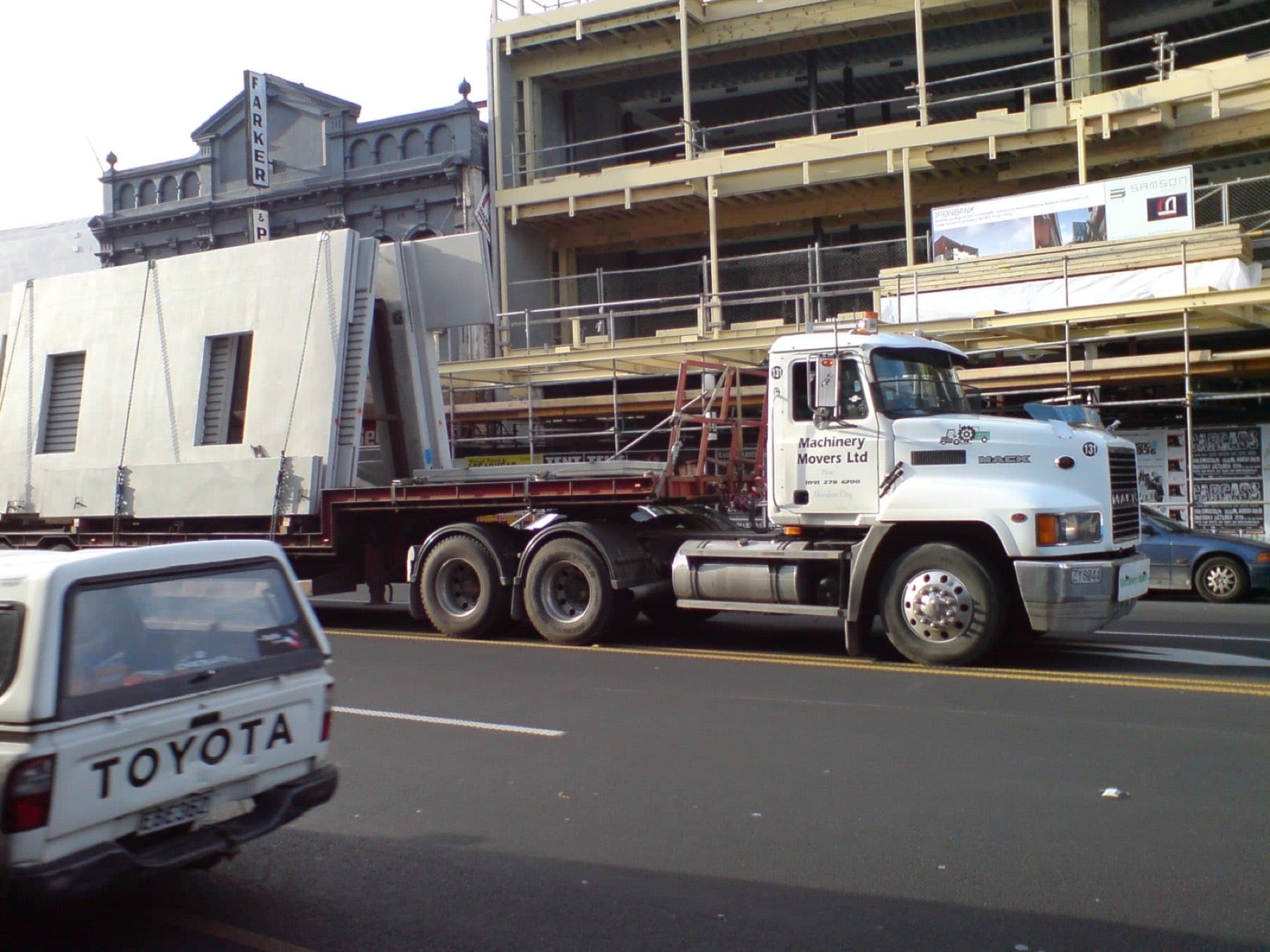 Precast wall panels loaded on a flatbed truck for delivery